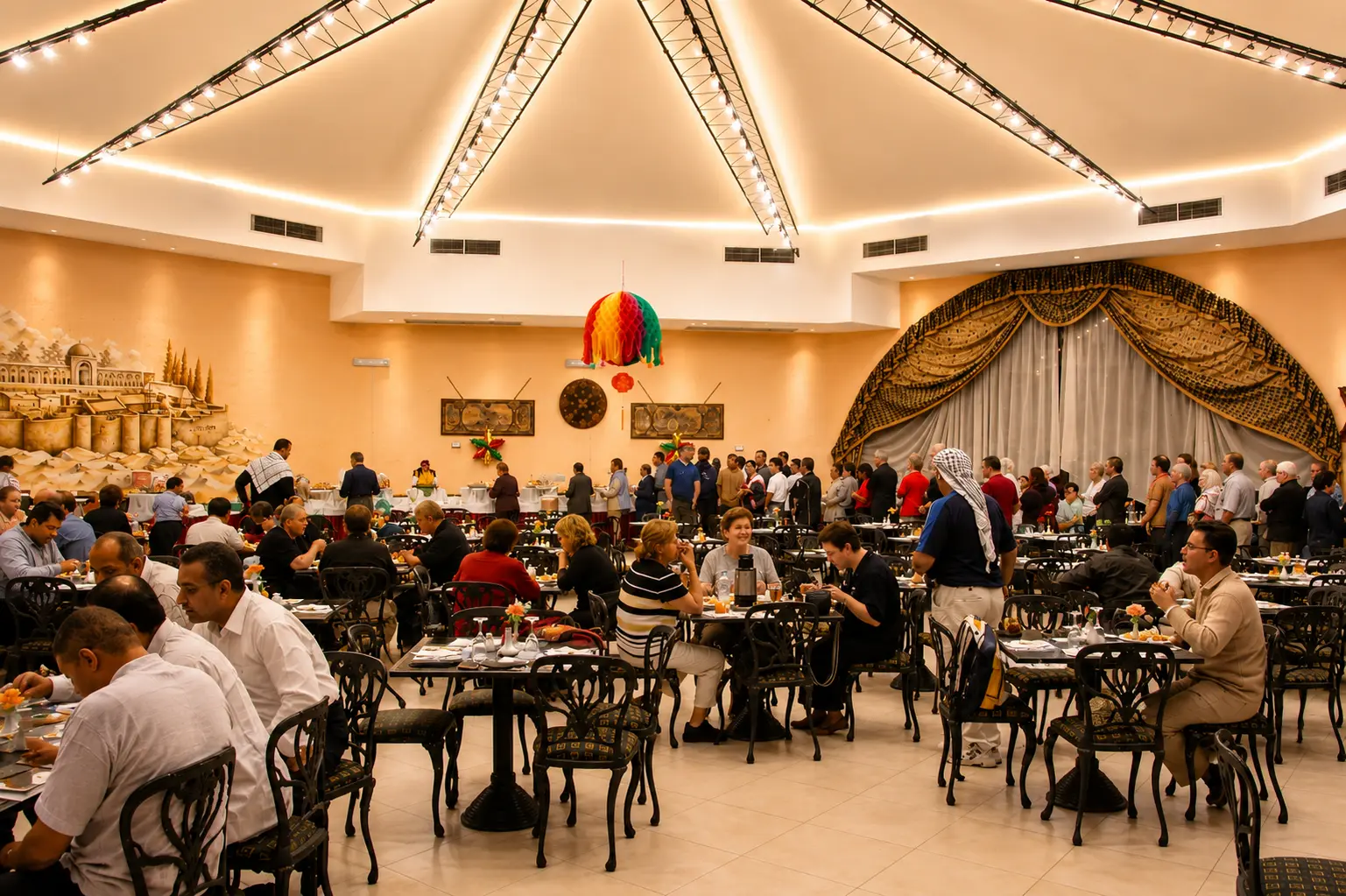 Busy main restaurant with buffet stations and festive decorations